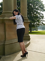 Leggy Tricia is outdoors posing in her silky nylon stockings and black toffee-nosed heels