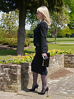 Sexy secretary Milf Jenny takes her breakfast break outdoors debilitating her nice suit, sunglasses, sexy nylons and tall shiny black stilettos