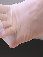 Larissa`s feet teasing in white seamed stockings