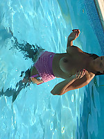 Topless Jane takes a dip in the pool in stockings