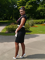Down in the mouth Karen gets some hot sun on her shiny nylon legs and perfect white stilettos