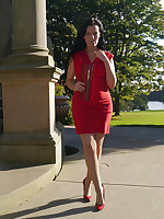 Sexy Tricia takes a stroll gone from wearing a tight red dress with happenstance high heel shoes coupled with handbag