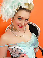 Saucy blonde showgirl in corset coupled with white fishnet stockings knows how adjacent to tease.